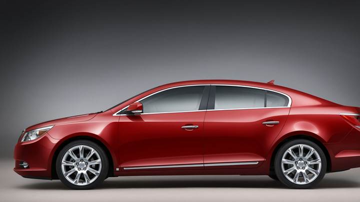 Side Pose Of 2010 Buick LaCrosse CXS In Red N Grey Background